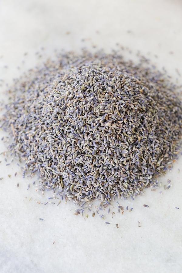 Pile of dried lavender on a marble table to make sachets