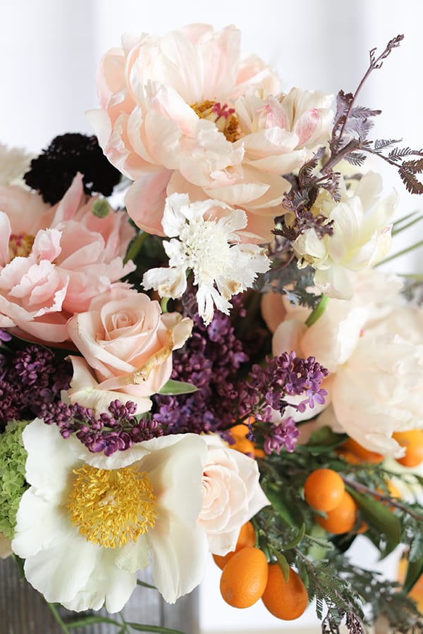 pink flowers with kumquats 