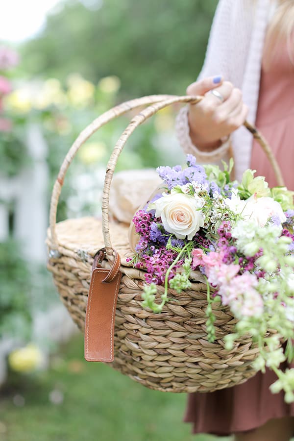 Mother's Day picnic basket with flowers. 