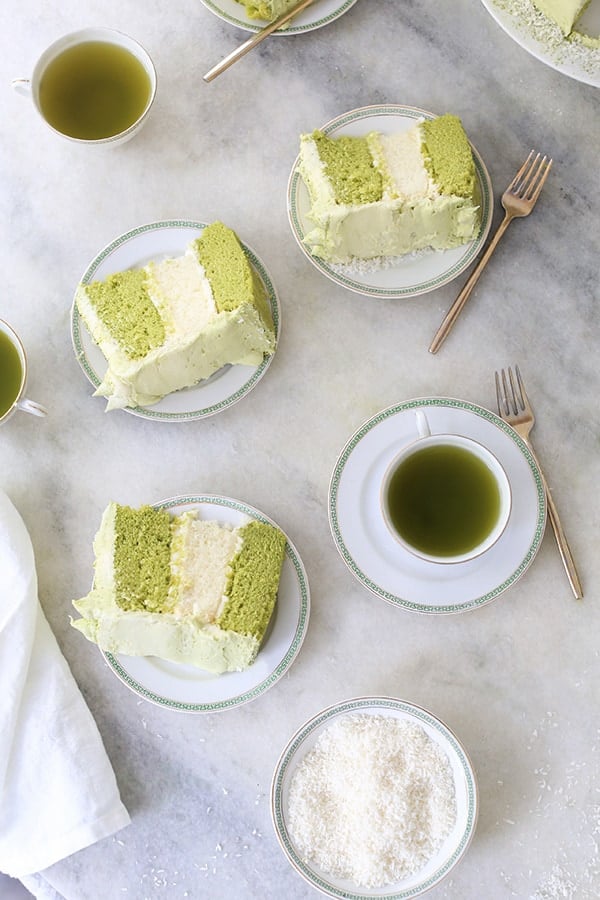 matcha cake slices with frosting and matcha tea