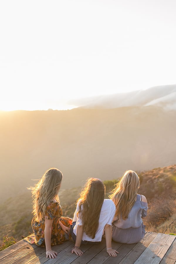 Girls looking out at the sunset