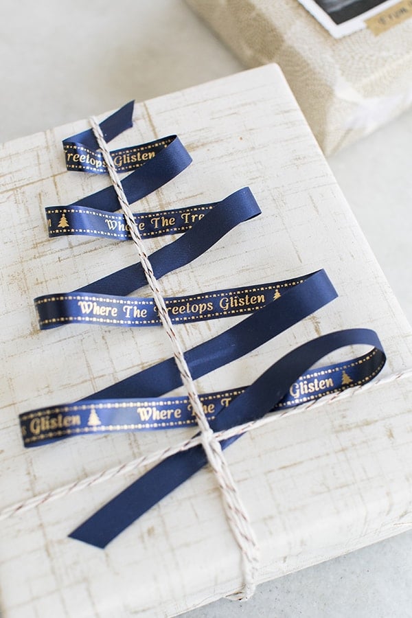 Custom ribbon shaped in the form of a tree with a special message on the blue ribbon. 