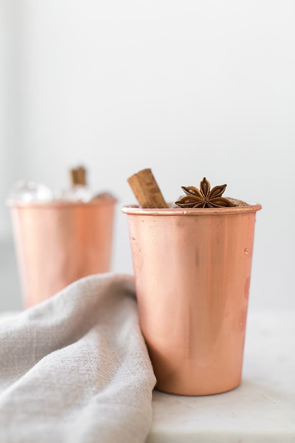 shot of copper mugs with cold brew coffee recipe in it