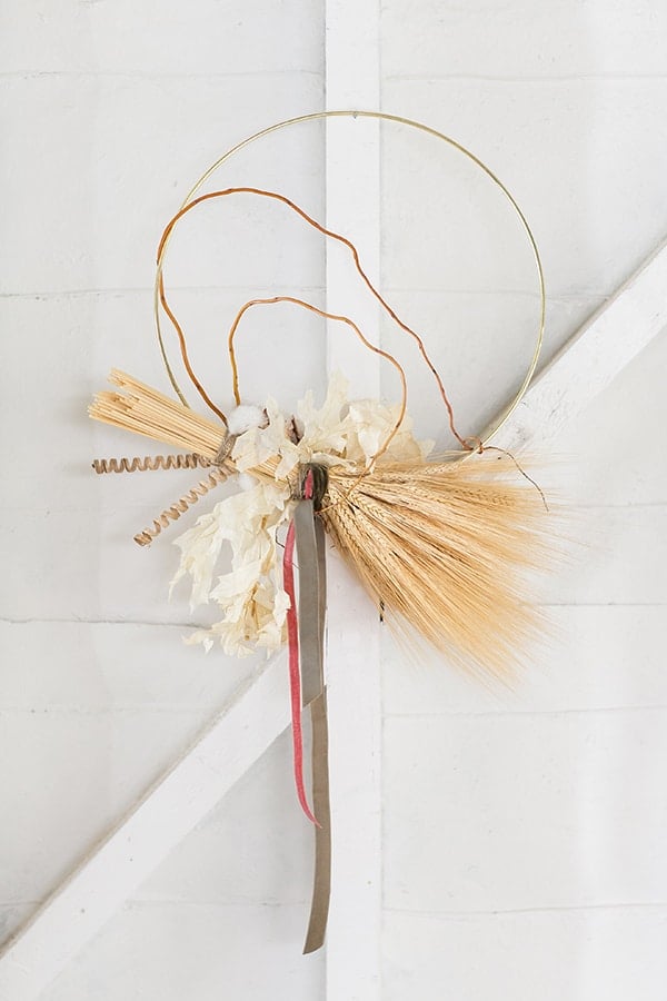 shot of thanksgiving decoration of wrapped wheat, on a wall