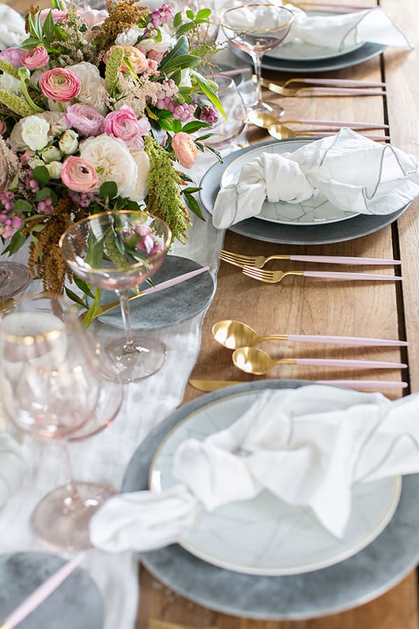 shot of  thanksgiving table decor with plates and cutlery