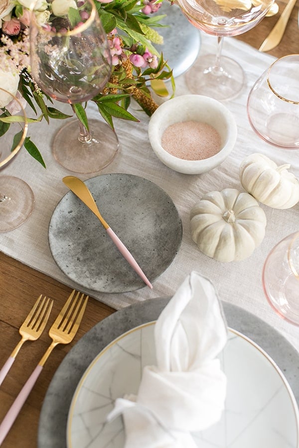 overhead shot of plates, part of the  thanksgiving table decor