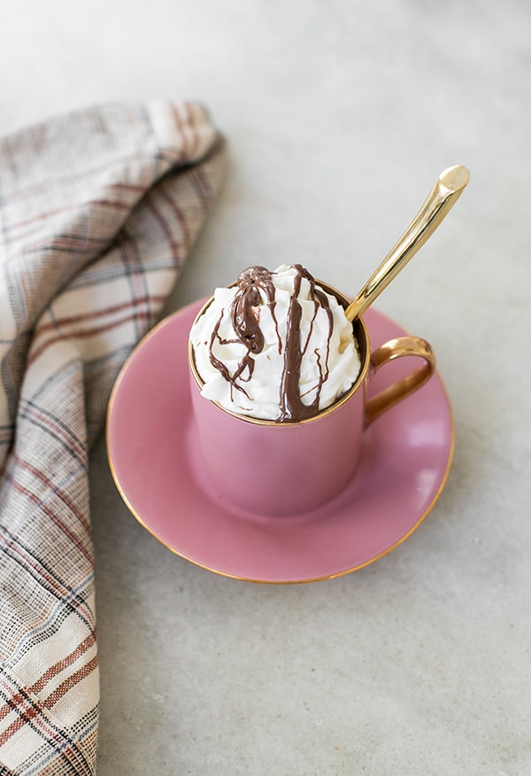 Hazelnut coffee with whipped cream and chocolate.