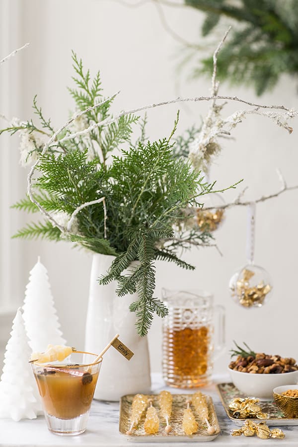 shot of vase with foliage on drinks table