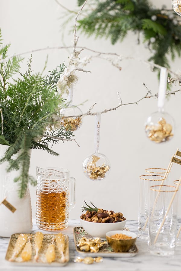 side shot of cocktail and snacks on the drink station