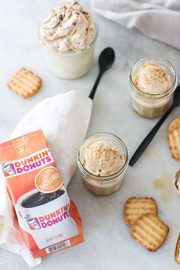 Tiramisu Coffee Milkshake on a table with Dunkin' Donuts coffee 