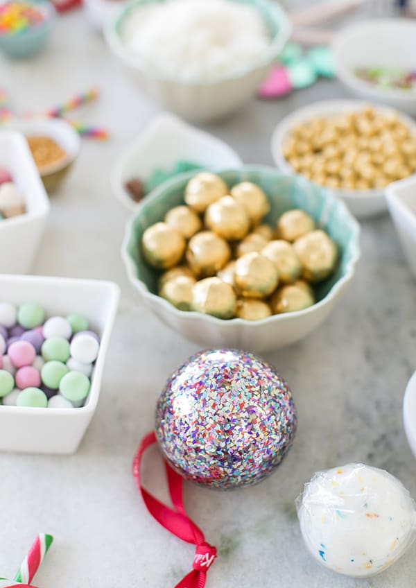 shot of Christmas bauble on a table - graham crackers, guests arrive