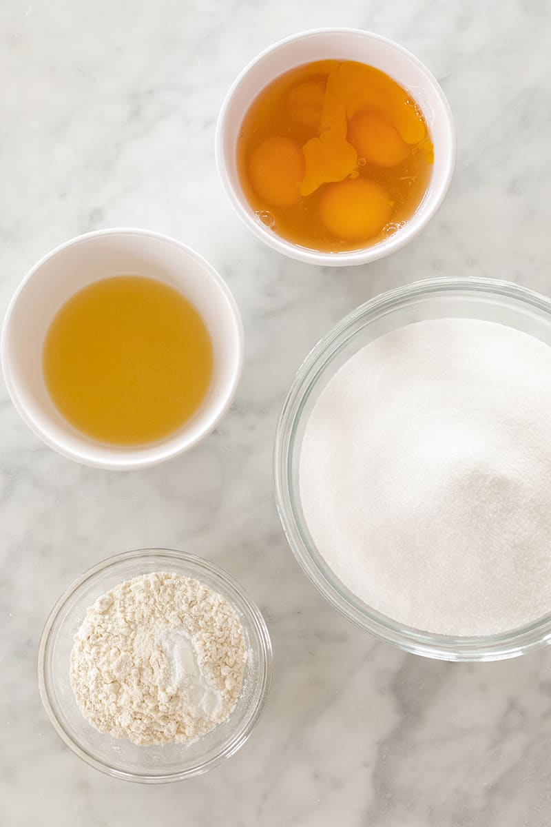 Lemon juice, sugar, eggs and flour to make lemon bars with shortbread crust.