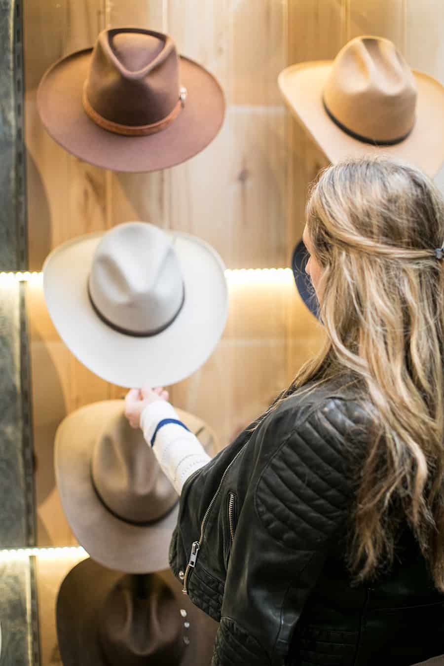 Eden Passante picking out hats shopping in Carmel 