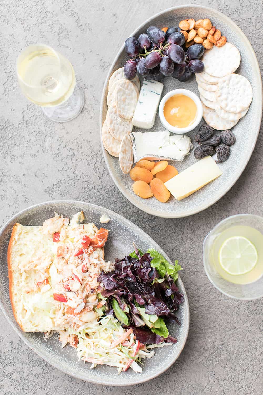 wine and cheese and a lobster roll