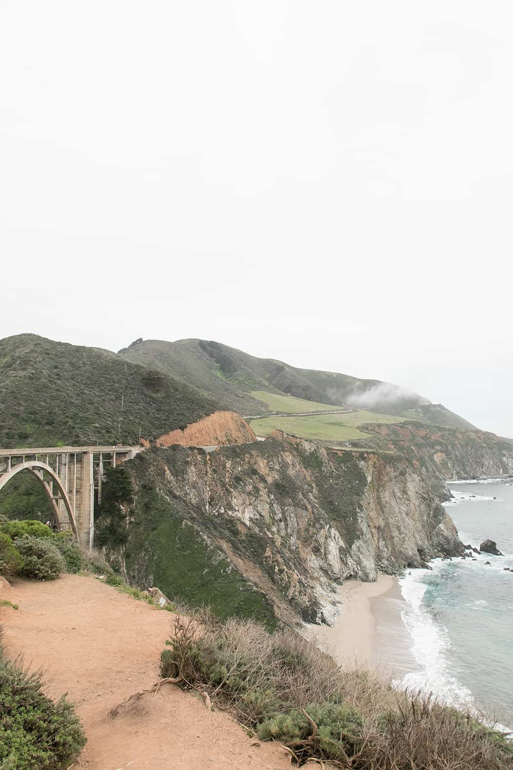 Bridge and green mountains 