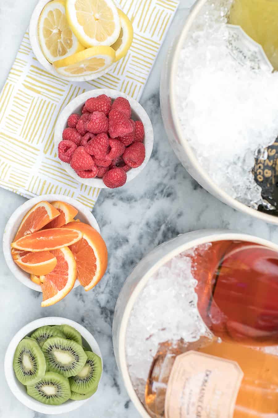 Fruit in bowls filled for a bubbly bar