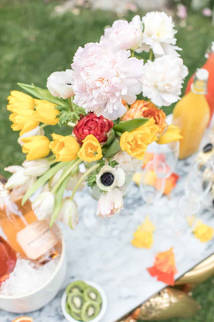 Beautiful flowers for a college graduation bubbly bar. 