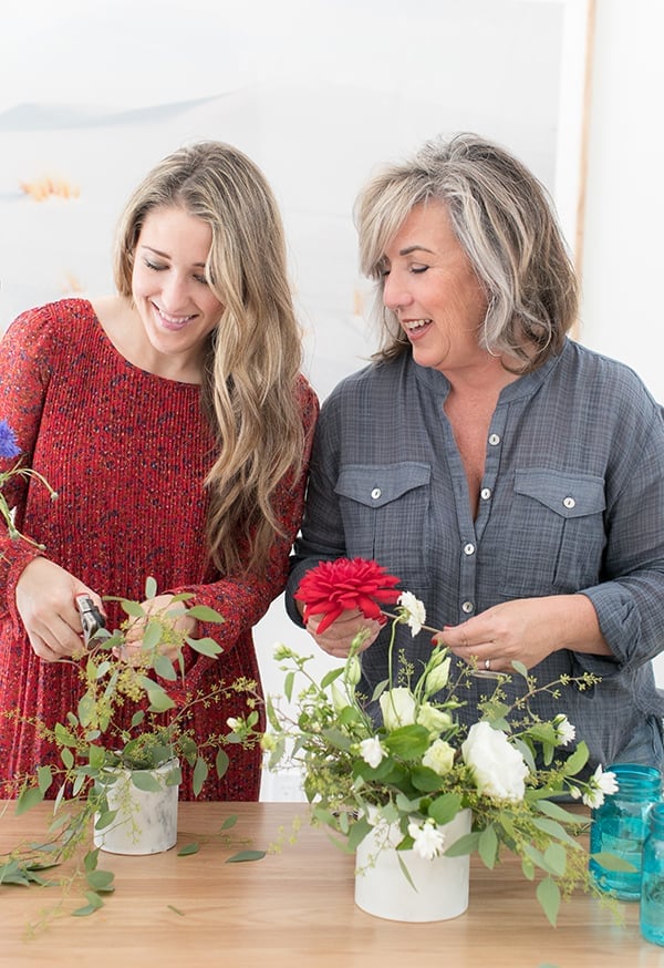 Eden Passante making a 4th of July flower arrangement 