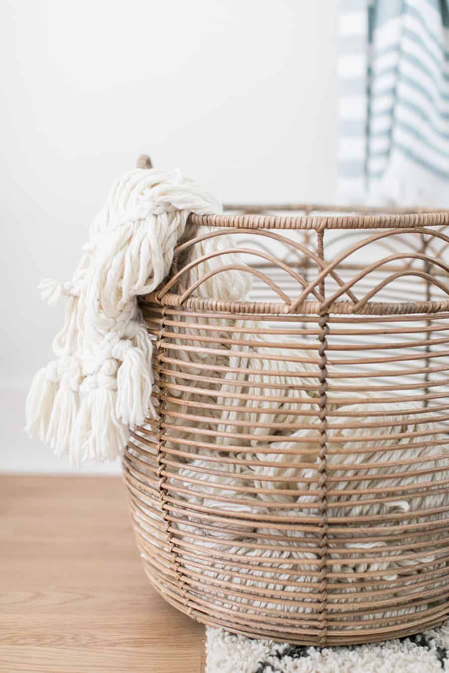 Laundry basket with a knit blanket