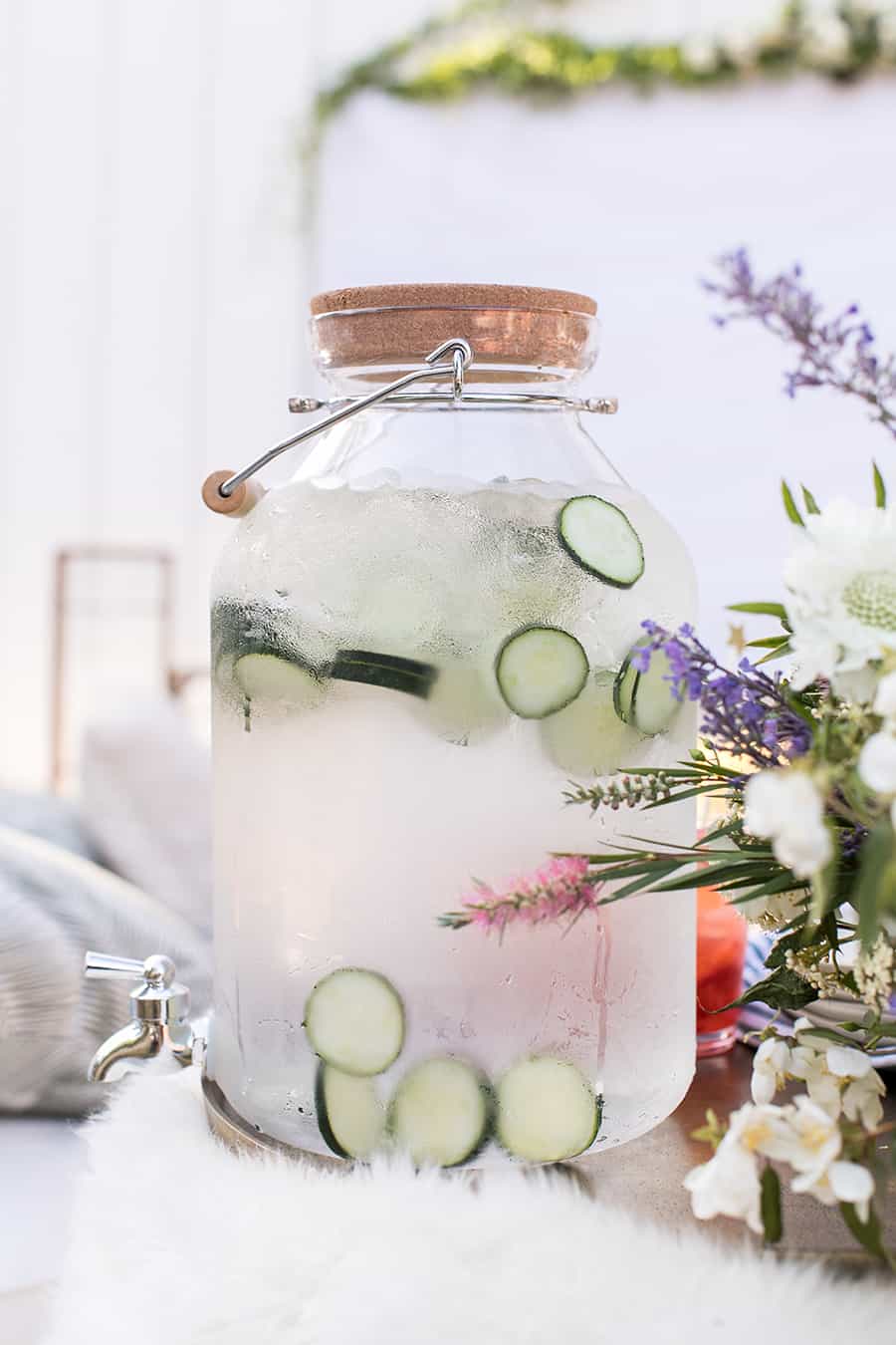 Drink dispenser with cucumber inside.