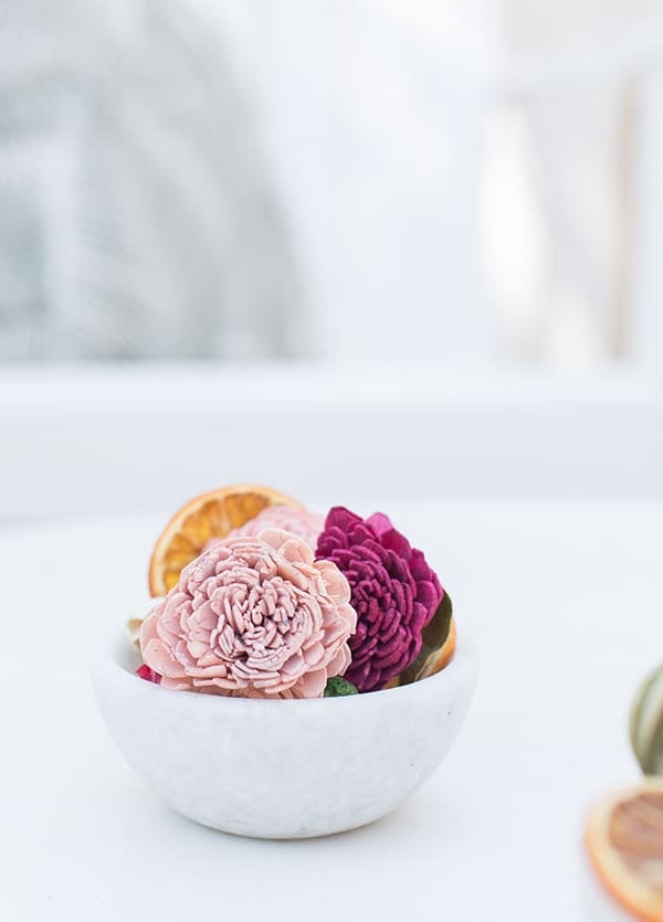 dried wooden flours in a marble bowl.