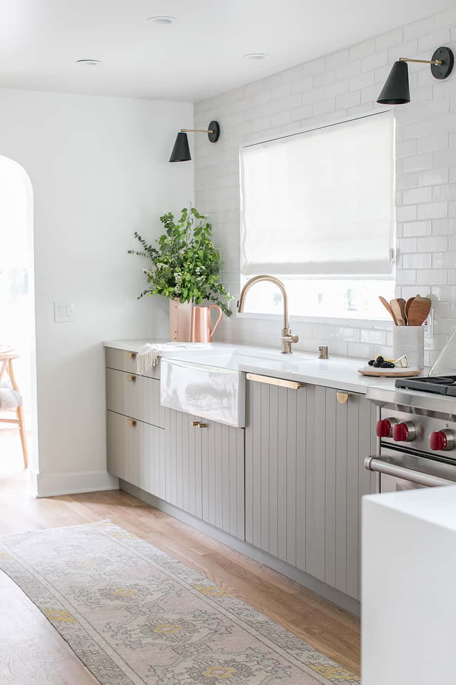 kitchen and dining room remodel with Ikea cabinets, farm sink, fireclay tile, black sones.