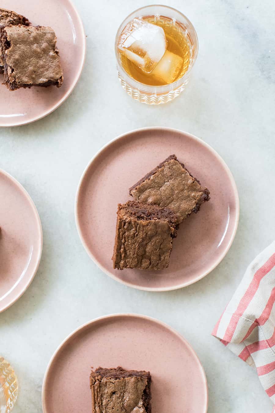 Chocolate brownies with bourbon on a marble table - bourbon brownies