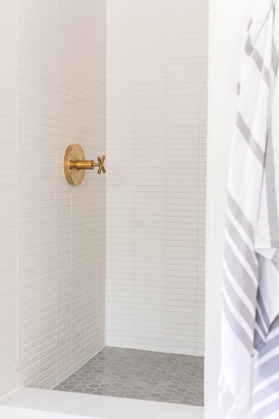 Fireclay shower tile with brass