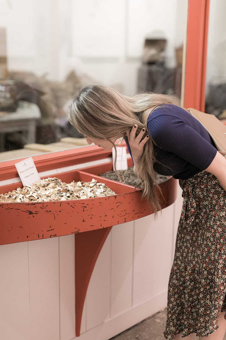 Eden Passante smelling herbs at Palais Bénédictine