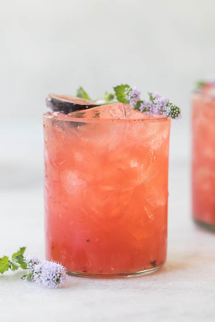 Pink Sidecar with edible flowers.