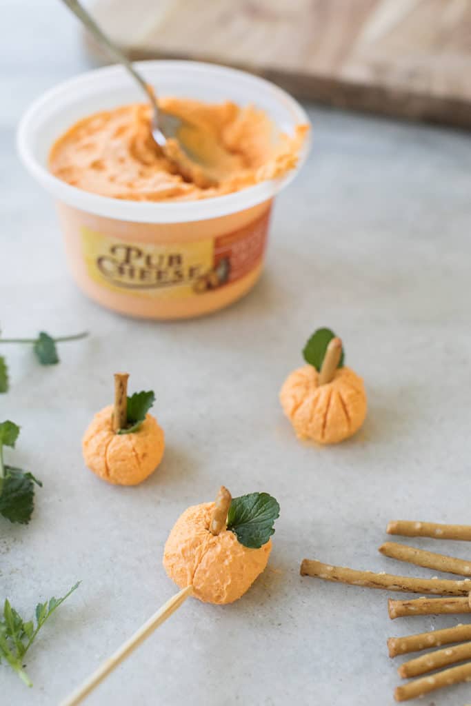 Cheese pumpkin balls to put oon a Halloween charcuterie board. 