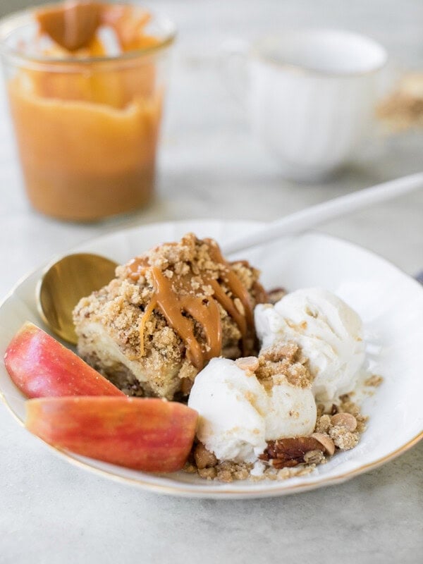 Caramel Apple Crumble Bars served with vanilla ice cream and crumble topping