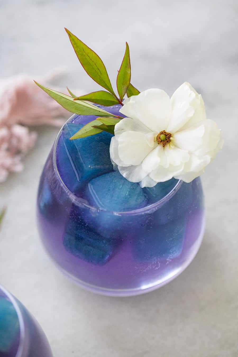 blue cocktail cubes in a glass