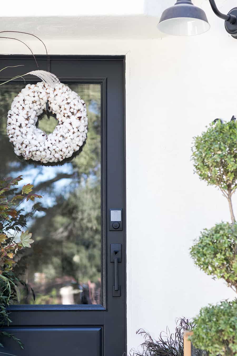 Black door with white wreath