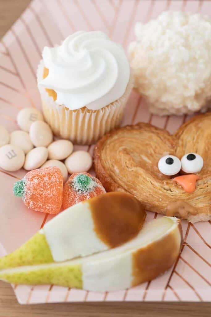 A plate filled with cute Thanksgiving desserts from a Thanksgiving dessert table.