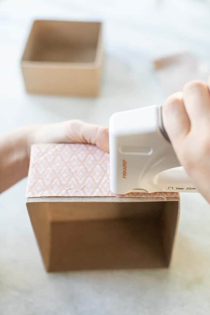 Adding fabric to boxes for left over desserts.