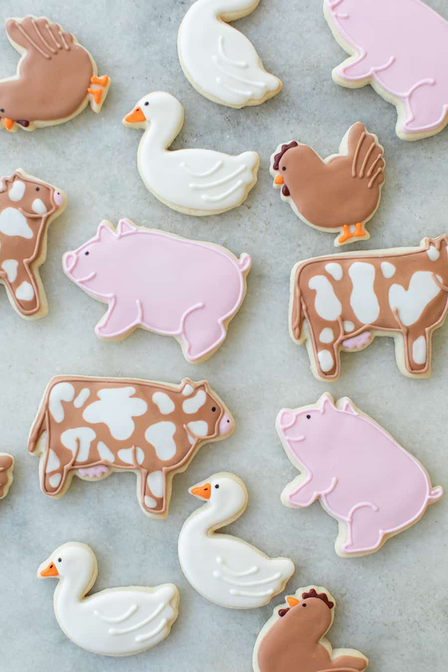 cow, pig and geese sugar cookies for a barnyard birthday party