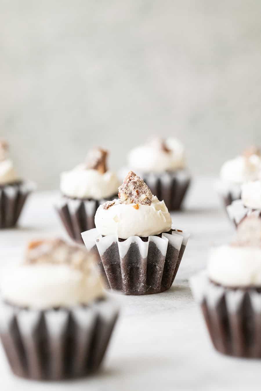 toffee chocolate cupcakes spread on a table