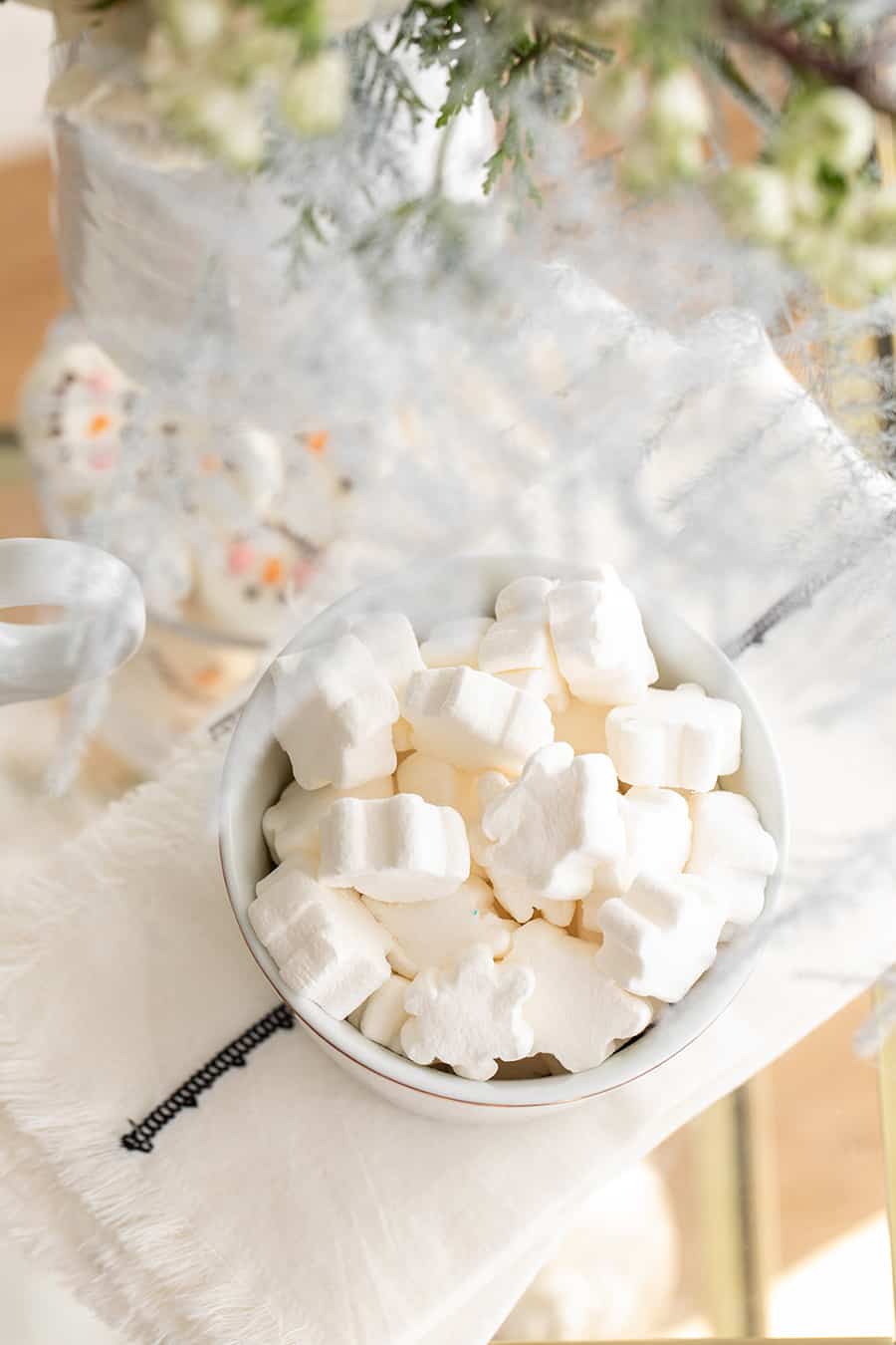 Snowflake marshmallows on a hot chocolate bar.