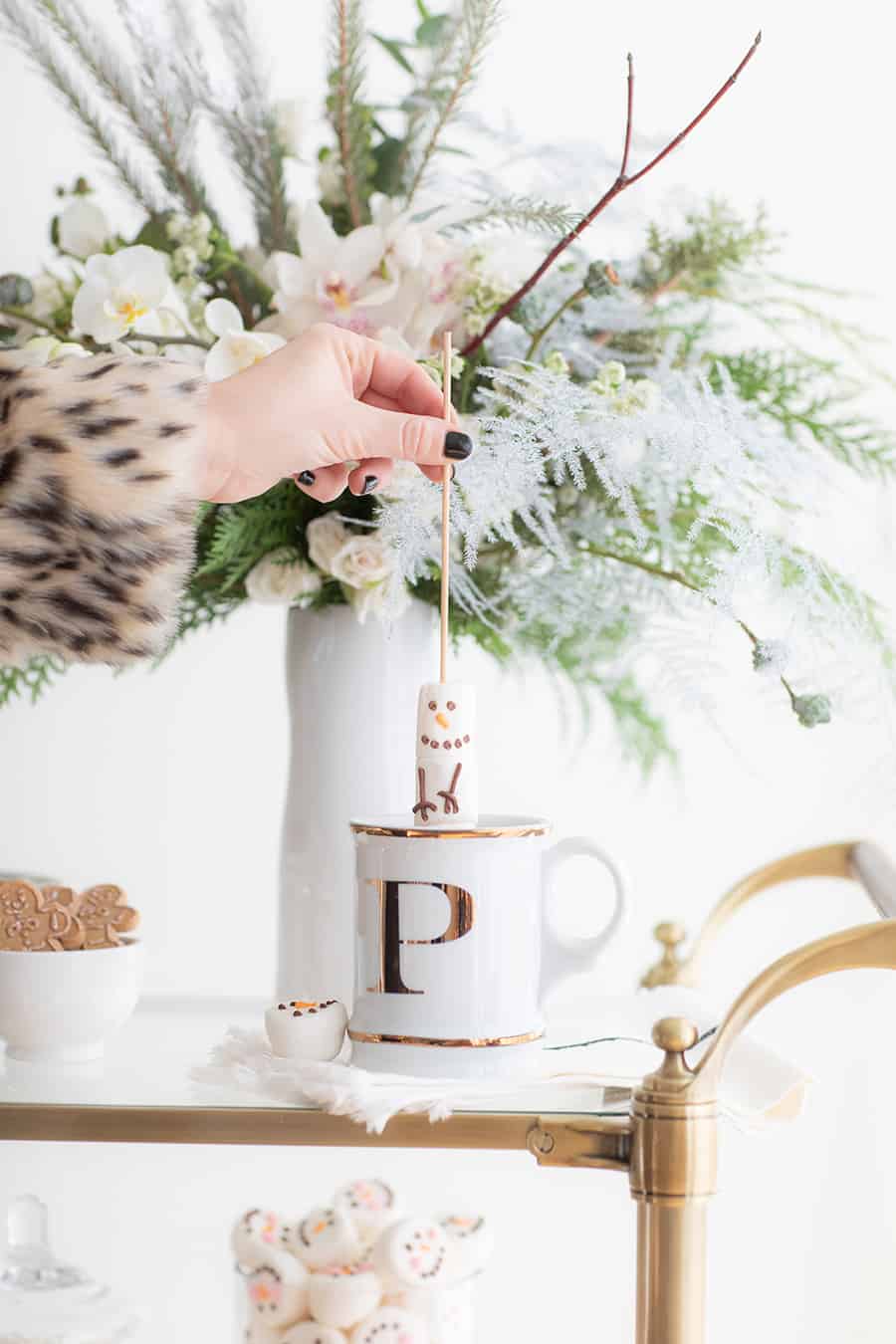 Gold mug with snowman on a stick 