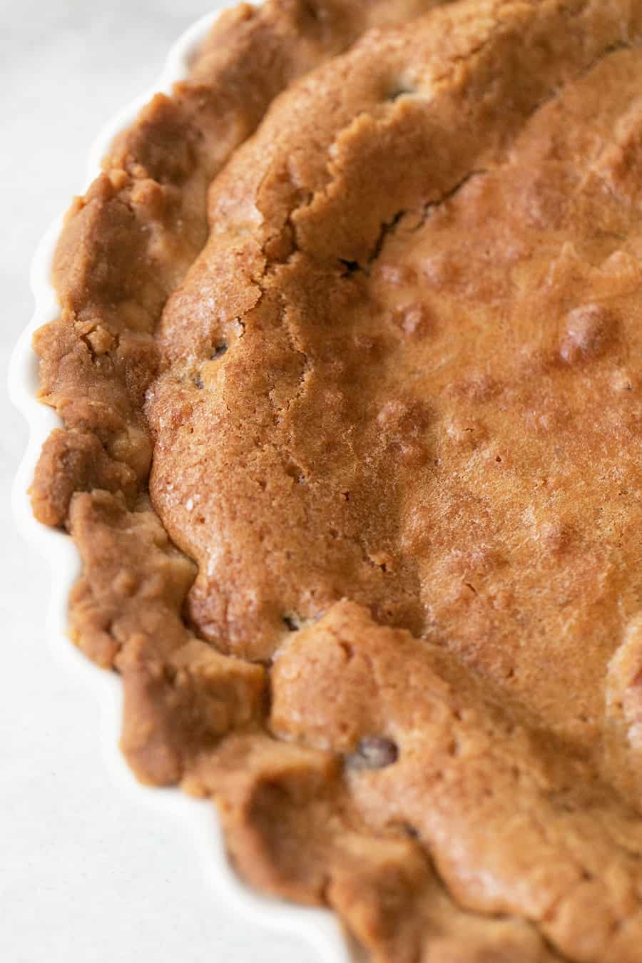 Golden brown chocolate chip cookie pie.