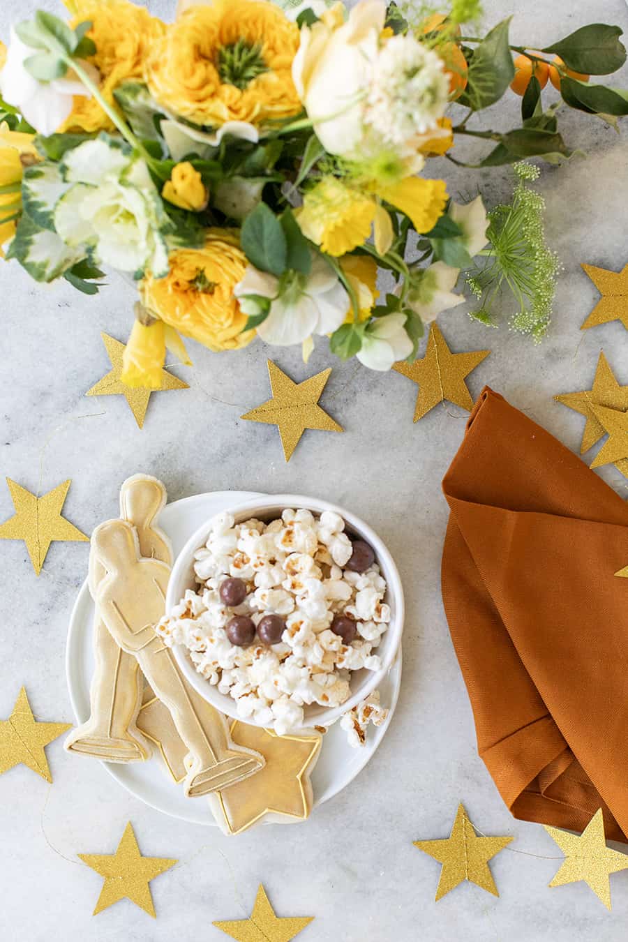 Popcorn and Oscar party cookies with gold stars.