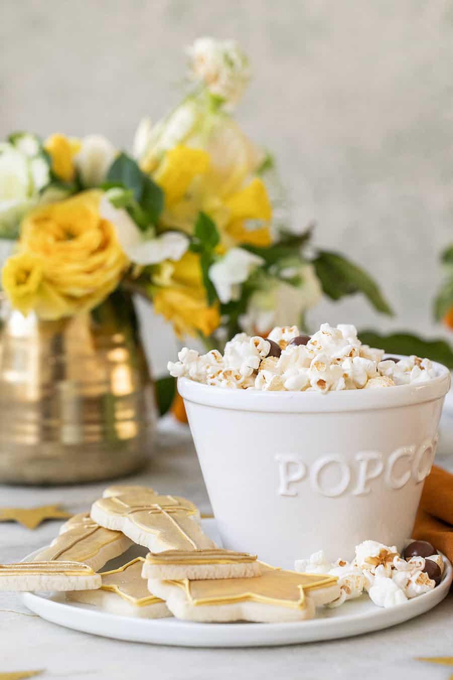 Popcorn in white popcorn bowl