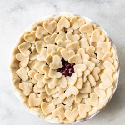 The most delicious cherry pie with an easy heart shaped, butter pie crust!