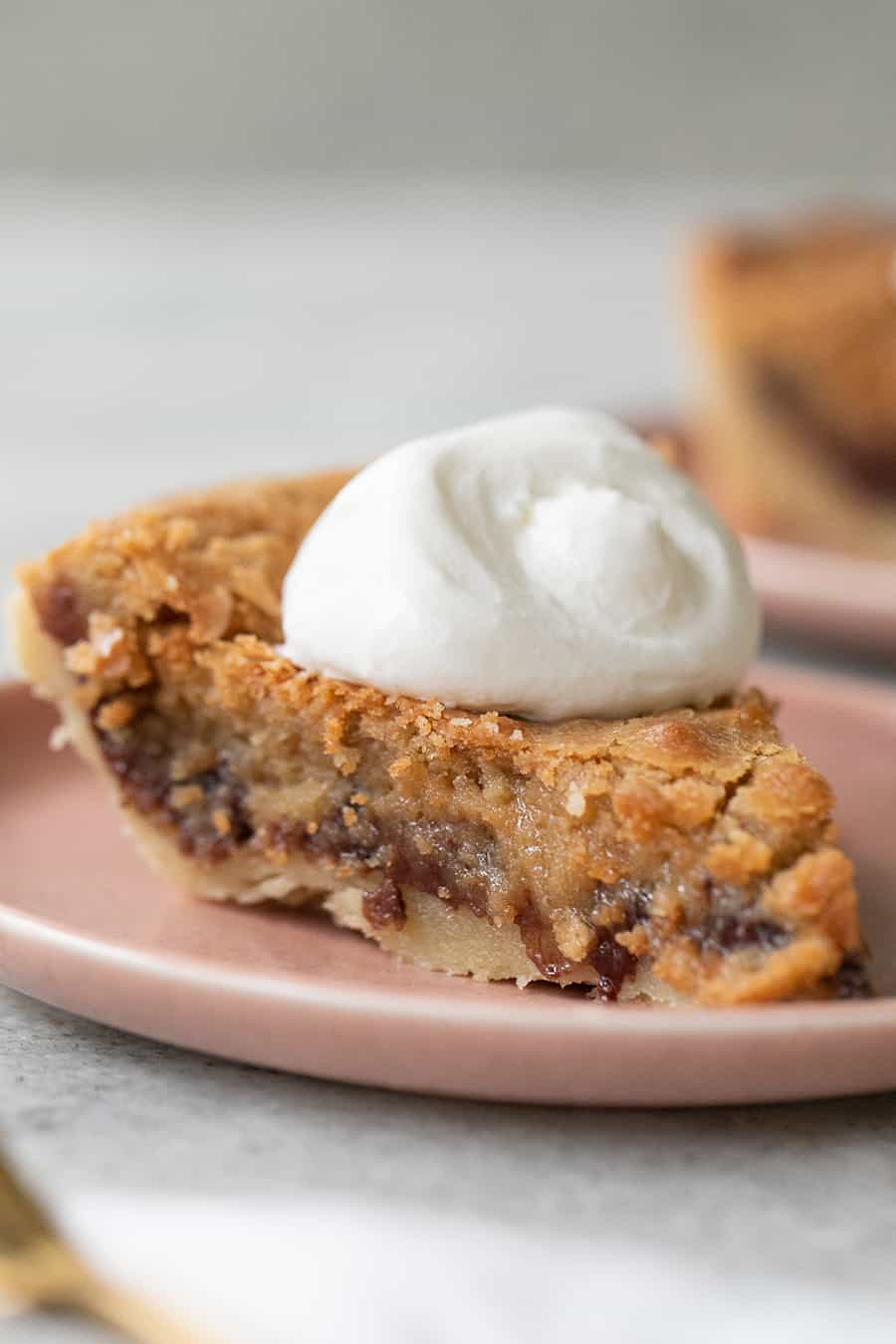 Chocolate chip cookie pie with whipped cream.