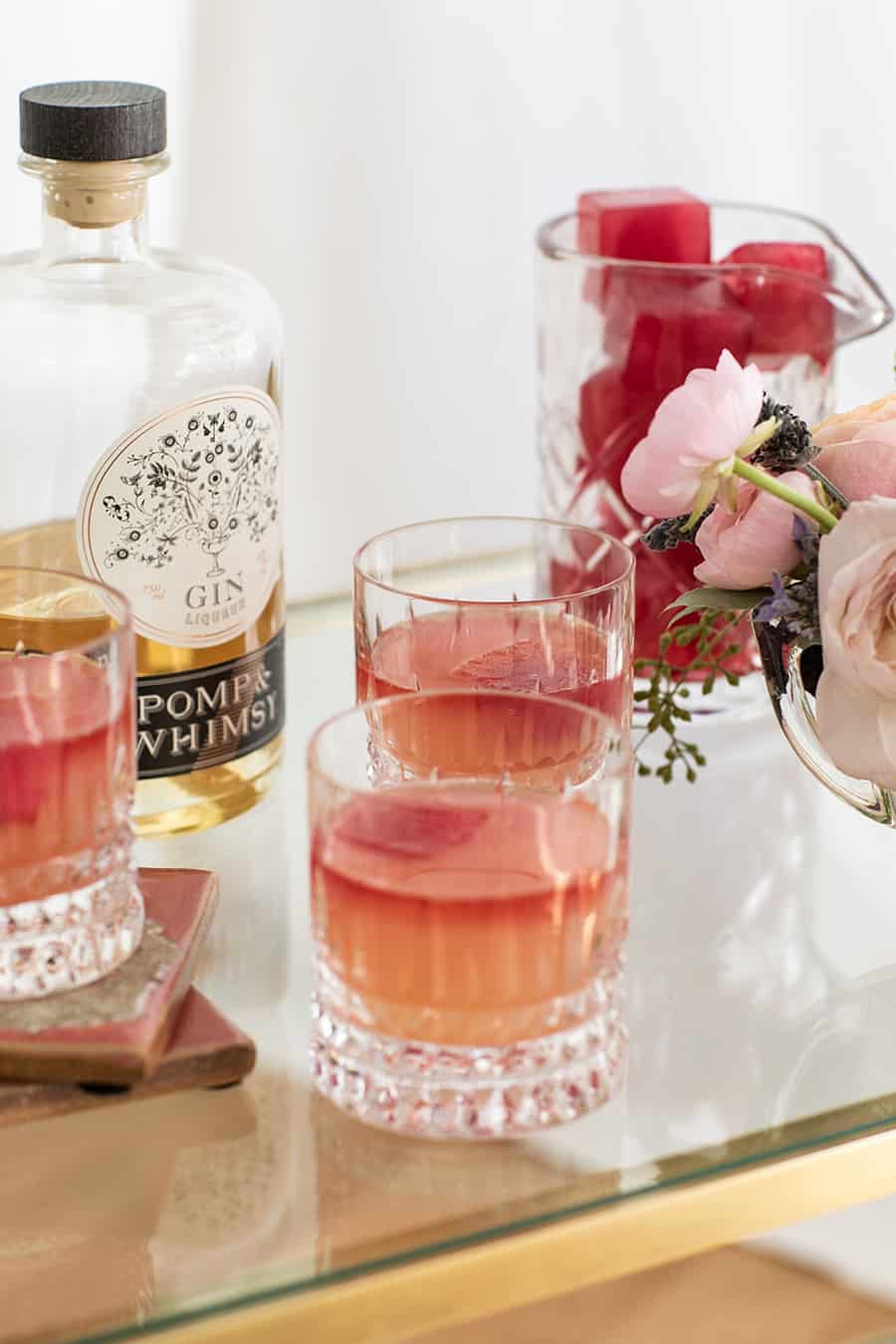 Beautiful pink cocktails with hot pink ice cubes