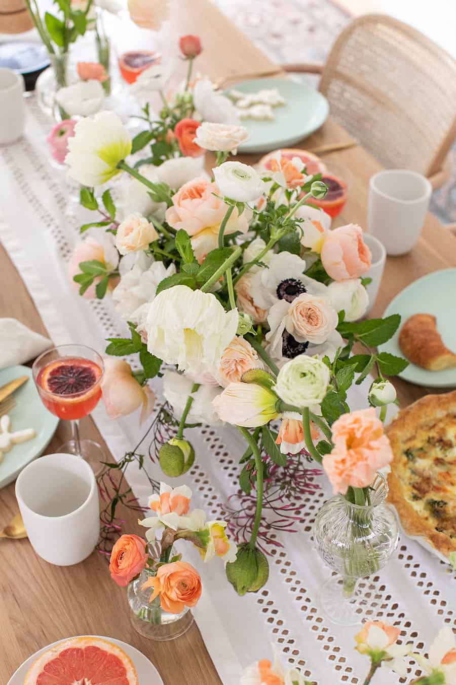 Stunning flowers on a table setting for Easter brunch.