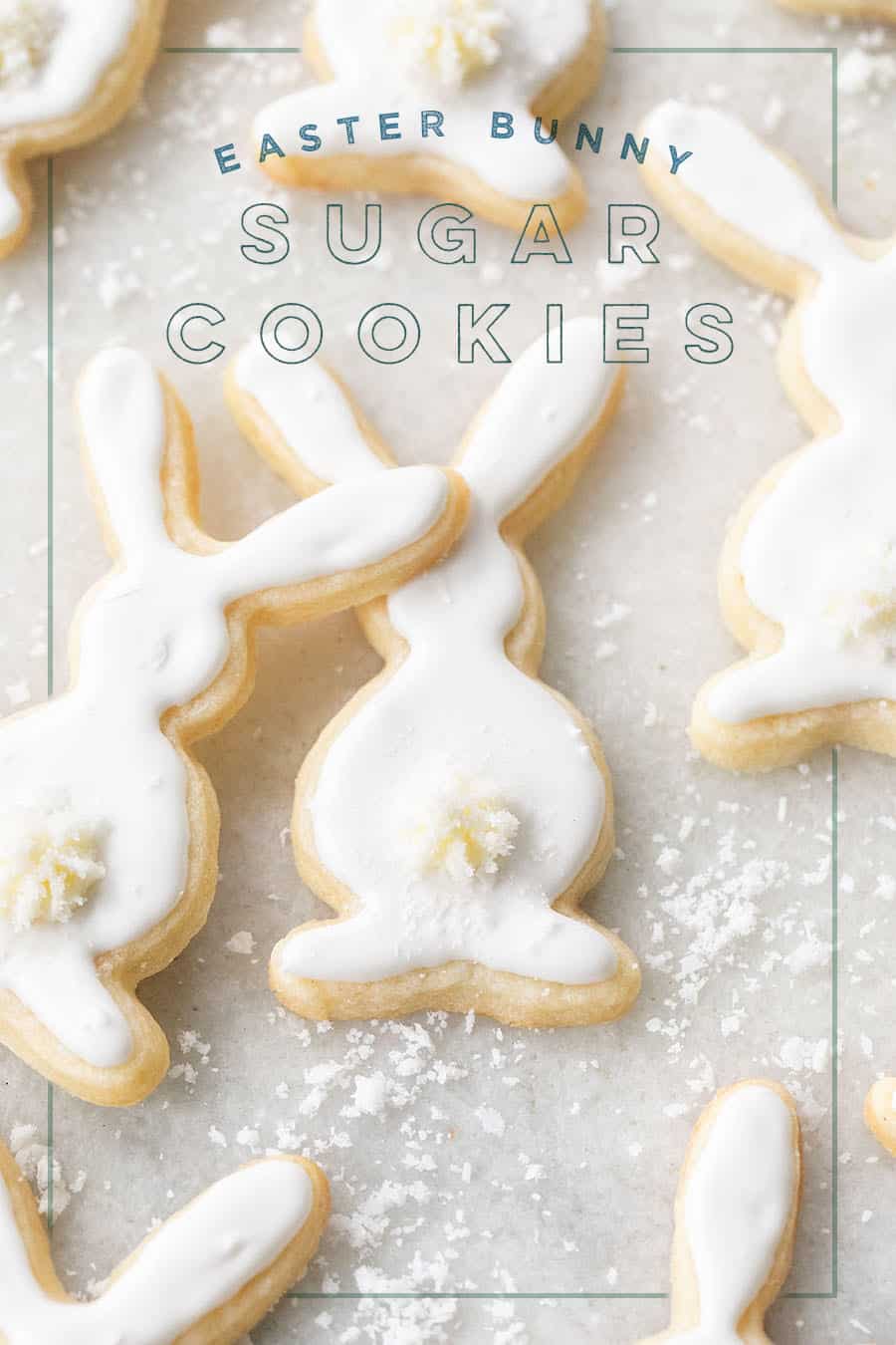 Easter cookies shaped like bunnies with buttercream tails.