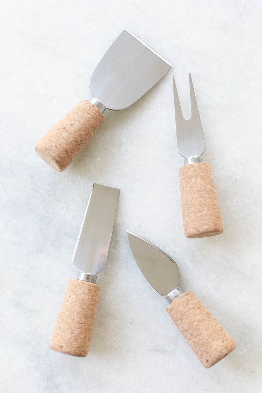 Overhead of cork cheese knives