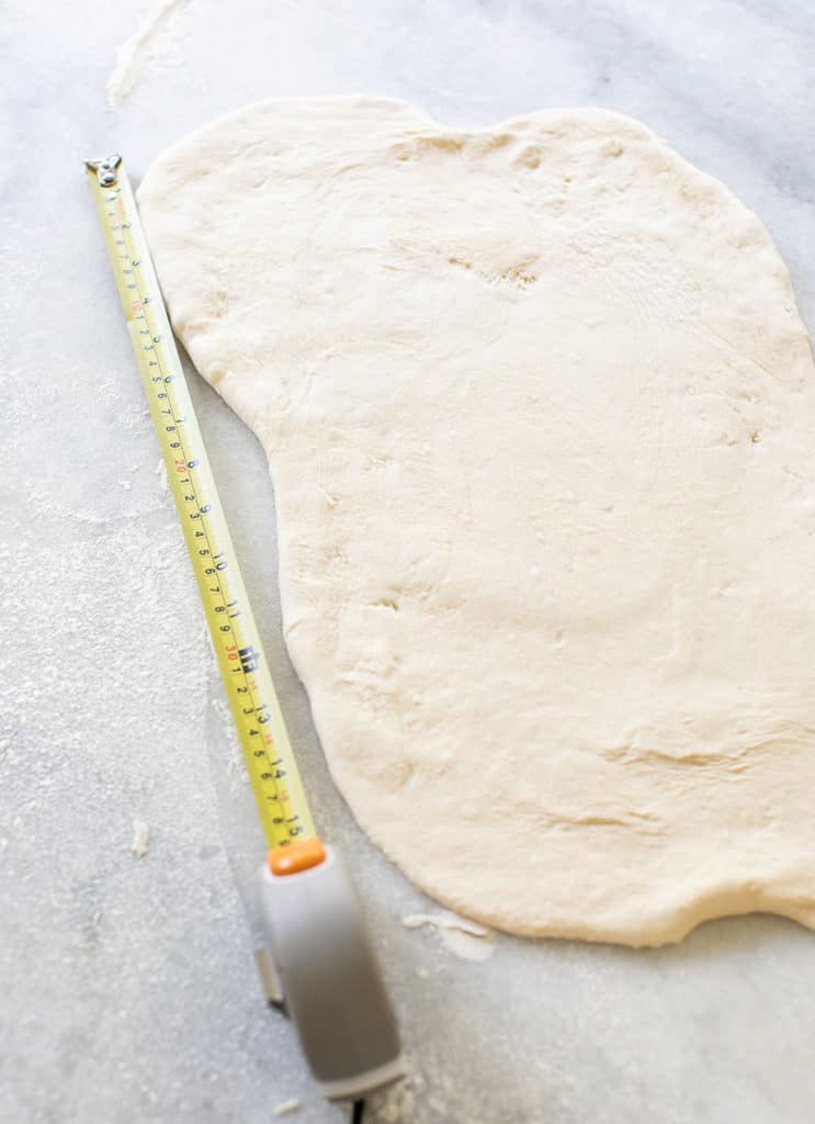 Roll the dough to 15" long when making cinnamon rolls.